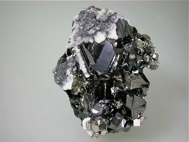 Sphalerite with Calcite and Arsenopyrite, Trepca Complex, Kosovska Municipality near Mitrovica, Kosovo, Mined 2015, Miniature 4.0 x 6.0 x 8.0 cm, $250.  Online 5/22/15 SOLD